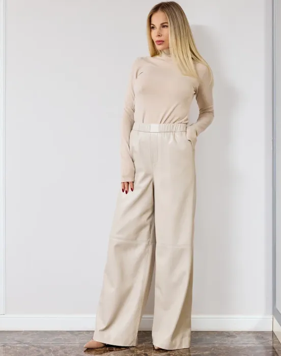 Брюки из мягкой эко-кожи с утеплением